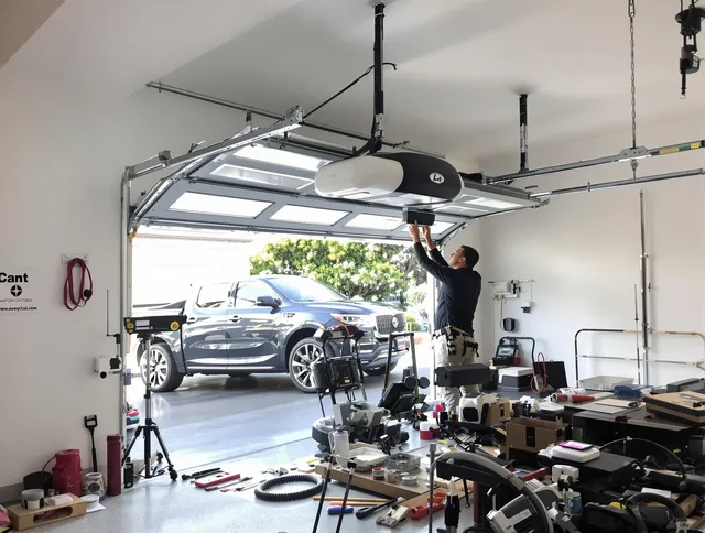 Scituate Garage Door Repair specialist installing smart garage door opener system in Scituate home
