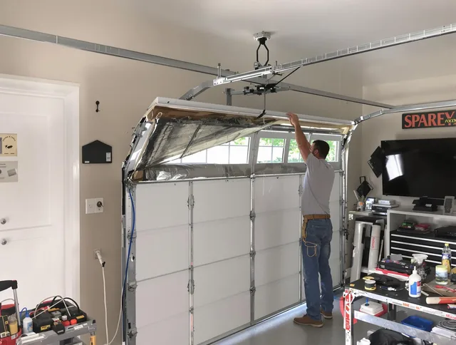 Garage door section replacement by Scituate Garage Door Repair in Scituate
