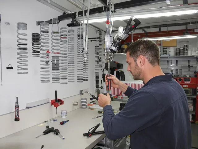Scituate Garage Door Repair safety certified technician performing precision spring replacement in Scituate