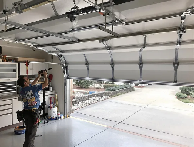 Garage door track repair service by Scituate Garage Door Repair in Scituate